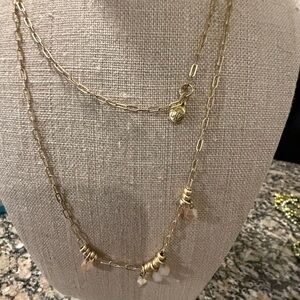 Trio of Elegant Gold and Silver tone Necklaces .